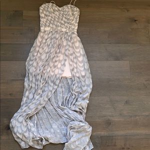 Maxi dress with light pink fitted dress underneath